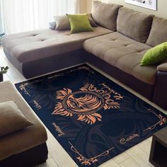 a living room with couches and a rug on the floor