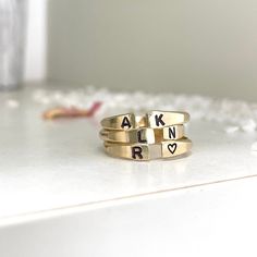 Our Personalized Open Cuff Ring might be small but it makes a mighty statement. This gorgeous minimalist style ring is perfect for stacking two, three, even four or layering with other ring styles. The fact that you can personalize it with initials and other designs just make it even better or leave it blank, it's totally up to you. Besides initials, this piece can be personalized with numbers, hearts, stars,s or flower symbols. This ring is hand-made and stamped in our studio at the time of order, of heavy 10 gauge 14kt gold filled metal wire. It's about 2mm thick and has an organic shape that is created by working the metal. This ring is 100% 14kt gold-filled, it is very durable and will wear very well with appropriate care, it will not change color or discolor your skin. I promise you'r Flower Symbols, Open Cuff Ring, Flower Symbol, Ring Styles, Cuff Ring, Cuff Rings, Rings Engagement, Gold Filled Jewelry, Kitchen Stuff