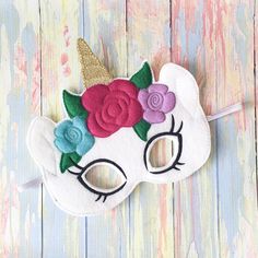 Featured is a Bohemian Unicorn Mask with beautiful flowers and a glitter gold horn. Mask is available in 2 sizes: Kid & Adult WHY BUY: - Hand out as party favors - Add to a gift for a magical little girl - Gift to someone who believes in unicorns - Can be used in cosplay - Fits in a Christmas Stocking - Wear to a costume party - Need a Secret Santa gift? PARTY PRICING: - I offer various discounts for orders of 10+. For Party rates please send me a message. MATERIALS: - Mask is made out of Unicorn Mask, Gold Horns, Gold Rate, Secret Santa Gift, Party Needs, Glitter Gold