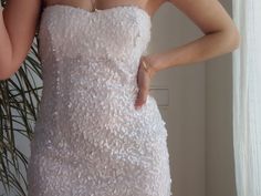 "Vintage white sequin mini dress. Strapless sequinned short dress. Size S. Fully lined with elastic fabric. Measurements lying flat: Bust: 17.3\" / 44cm Waist:13.4\" / 34cm Hips: 18\" / 46cm Length: 26\" / 66cm Very good condition." Fitted Mini Sequin Dress For Wedding, Fitted Mini Length Sequin Dress For Wedding, Glamorous Mini Sequin Wedding Dress, Glamorous Mini-length Sequin Wedding Dress, Glamorous Wedding Mini Sequin Dress, White Mini Sequin Dress For Prom, Glamorous Mini Sequin Dress For Wedding, Glamorous Mini-length Sequin Dress For Wedding, Mini Length Sequin Fabric For Prom In Spring