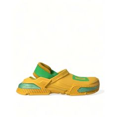 Step Into Comfort And Style With Our Stunning New Clogs Slippers. Made With The Finest Rubber, These Shoes Are A Perfect Blend Of Luxury And Practicality. The Vibrant Yellow Hue Accented With Green Details Offers A Pop Of Color To Your Ensemble, While The Durable Rubber Sole Ensures Lasting Wear. Impeccably Crafted By The Renowned Dolce & Gabbana, These Slippers Are Synonymous With Italian Excellence. Material: Rubber Color: Yellow Country Of Origin: Italy Brand: Dolce & Gabbana Rubber Sole Logo Dolce Gabbana Men, Rubber Clogs, Green Details, Dolce Gabbana Shoes, Clog Slippers, Slippers Shoes, Dolce Gabbana Dress, Boot Pumps, Dolce E Gabbana