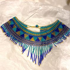 Very Unique And Conversational Choker Necklace. Never Worn. Reminds Me Of A Peacock! Would Love Someone To Have This Piece!! Very Bohemian, Festival Look! Festival Blue Beaded Necklaces With Colorful Beads, Handmade Blue Beaded Necklaces For Festivals, Blue Beaded Necklaces For Festivals, Traditional Blue Beaded Necklaces, Handmade Blue Beaded Festival Necklaces, Blue Beaded Necklaces With Large Beads For Festive Occasions, Blue Bohemian Necklaces For Party, Festive Blue Beaded Necklaces With Large Beads, Festive Blue Beaded Necklace With Large Beads