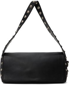 Grained leather shoulder bag in black. · Studs at fixed shoulder strap and sides · Zip pocket at back face · O-rings at side · Logo-embossed magnetic flap · Patch pocket at interior · Twill lining · Logo-engraved antiqued silver-tone hardware · H5.5 x W11 x D4.25 Supplier color: Black Black Saddle Shoulder Bag With Palladium Hardware, Black Studs, Black Stud, Travel Gear, O Ring, Travel Luggage, Luggage Bags, Leather Shoulder Bag, Patch Pocket