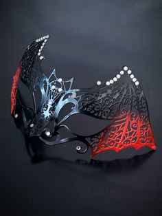 Our women's bat metal masquerade mask, adorned with red accents and sparkling rhinestones, is your key to a night of gothic enchantment and timeless beauty. Designed for hours of comfortable wear, so you can dance and mingle with ease. Whether you're attending a gothic masquerade ball or simply looking to make a dramatic entrance, this mask ensures you'll be the center of attention.


Age Group/Gender - Adult/Women

Size/Type - One size fits all adults

Mask Color - Red/Black

Mask Material - La Gothic Halloween Masks, Gothic Masquerade Eye Mask For Theater, Gothic Masquerade Eye Mask, Gothic Style Masquerade Eye Mask, Gothic Eye Mask For Masquerade, Gothic Eye Mask For Theater Masquerade, Gothic Masquerade Mask For Halloween Theater, Gothic Eye Mask For Theater, Gothic Adjustable Masquerade Mask