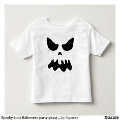 a white t - shirt with a black face on it