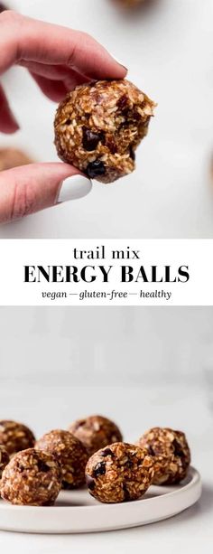 a person holding a cookie in their hand with the words fruit mix energy balls on it