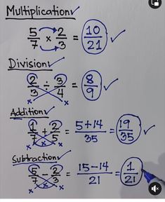 a piece of paper with numbers and fractions written in blue ink on white paper