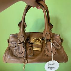 Chloe Tan Paddington Bag Excellent Condition. Missing One Stud On Back. Dust Bag Included. *Model Picture For Size Reference Only. Chloe Bag, Bag Light, Model Pictures, Light Brown, Chloe, Dust Bag, Fashion Inspo Outfits, Bag Lady, Fashion Inspo