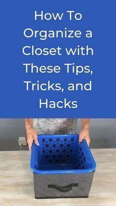 a person holding a blue bin with the words how to organize a closet with these tips, tricks, and hacks