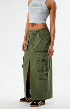 The PacSun Olive Cargo Midi Skirt is a perfect fusion of utility and style. With its chic midi length and functional cargo pockets, this skirt effortlessly combines fashion-forward design with practicality, making it a versatile and on-trend addition to your collection. This high-waisted midi skirt gets finished off with D-loop straps, a flirty front slit, and a raw-cut hem. 


	34.5" center front length
	Stretch fabric
	High-rise
	Zip fly closure
	5-pocket body
	Cargo side pockets
	D-loop straps
	Front slit
	Raw cut hem
	99% cotton, 1% spandex
	Machine washable
	Model is wearing a size small
	Model measurements: 5’5” height, 32” bust, 22” waist, 32” hips Cargo Midi Skirt, E Signature, My Mobile Number, Skirts Midi High Waisted, Take A Screenshot, Model Measurements, Pacsun, Midi Length, Stretch Fabric