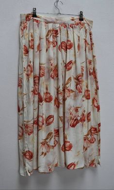 "a vintage white and red floral button-down midi-skirt ✿ IMPORTANT INFORMATION: * excellent vintage condition * material: 100% viscose * size: large - please check exact measurements below (they're there for your benefit!) ✿ MEASUREMENTS (taken while item is lying flat, some measurements will need to be doubled): * waist: 15.5\" (39cm) * hips: wide/loose * length: 31\" (79cm) ✿ free UK shipping on orders over £100 with code STRAWBERRY free international shipping on orders over £250 with code LEM White Floral Print Long Skirt, Red Midi-length Summer Bottoms, Red Midi Length Bottoms For Summer, Summer Full Skirt With Button Closure, Full Skirt With Button Closure For Summer, Red Buttoned Skirt For Summer, Spring Maxi Skirt With Buttons, Red Summer Skirt With Button Closure, Red Button Closure Skirt For Summer