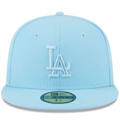 Get ready to cheer on the Los Angeles Dodgers in style by picking up this Spring Color 59FIFTY hat from New Era. It comes in a vibrant colorway and features an embroidered team logo on the front, making it the perfect option to pair with any game day outfit. The structured feel of this fitted cap is sure to to turn it into your new go-to option for cheering on the Los Angeles Dodgers. Officially licensed Flat bill with ability to curve Imported Structured fit Gray undervisor High Crown Wipe clea Blue Flat Bill Baseball Cap For Spring, Light Blue Snapback Hat, Blue Flat Bill Hats For Spring, Blue Flat Brim Fitted Hat For Fan Gear, Blue Snapback Hat With Flat Brim For Spring, Blue Fitted Hat For Sports Events, Blue Flat-brim Snapback Hat For Spring, Blue One Size Fitted Hat With Flat Brim, Blue Fitted Hat With Flat Brim, One Size