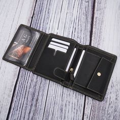 The AG Wallets Vintage Distressed Leather Hipster Wallet is the perfect blend of style and functionality. Crafted from high-quality napa cowhide leather, this wallet boasts a vintage distressed look that adds character to your personal style. Multi-Compartment Design: With six traditional credit card slots, two side credit card slots, one clear ID window, two bill compartments and a coin pocket with snap closure, this wallet offers ample space for all your essentials. High-Capacity: The dimensio Wallet With Coin Pocket, Fun Wallets, Custom Wallet, Hipster Style, Leather Passport Holder, Travel Purse, Personalized Wallet, Man Style, Minimalist Wallet