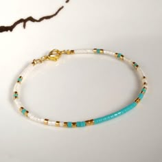 Gold filled blue miyuki delicate bracelet for women,layering dainty everyday bracelet,gold beaded bracelet,jewelry,jewellery,bohemian gift on Storenvy Minimalist Turquoise Beaded Friendship Bracelets, Minimalist Blue Heishi Beads Jewelry, Blue Minimalist 14k Gold Filled Bracelets, Miyuki Beads Bracelet, Gold Beaded Bracelet, Miyuki Bracelet, Everyday Bracelet, Rings Handmade, Diy Bracelets Patterns