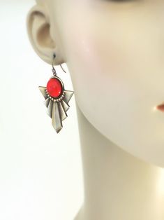 "Vintage Jewelry - Art Deco Earrings - Vintage Earrings - Black and White Earrings - Chevron Earrings - Brass Earrings - handmade jewelry So bold and beautiful! Large vintage brass Art Deco earrings embellished with bright red glass stones. So chic! Chloe says, Wear them and feel fabulous!\" They measure 2 1/4\" long from the top of the ear wire 1 1/4\" wide Thanks you for visiting Chloe's" Red Nickel-free Chandelier Earrings As Gift, Handmade Red Plug Earrings As Gift, Red Brass Earrings With Ear Wire, Artistic Red Round Earrings, Vintage Red Brass Earrings, Red Metal Drop Earrings, Red Brass Drop Earrings, Unique Red Brass Earrings, Artistic Red Jewelry For Jewelry Making