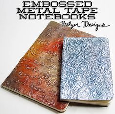 two notebooks sitting next to each other on top of a white surface with the words embossed metal tape notebooks written in blue and red