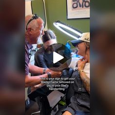 an older man getting his hair cut by a woman in a barbershop while another person looks on