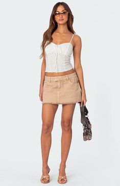 The ultimate closet basic, this super cute beige denim mini skirt will become an instant closet necessity.Mini skirtFrayed hemDenim fabric100% CottonModel wears size SModel height is 5'9Item care: Wash with similar color Edikted Womens Charli Frayed Denim Mini Skirt - Beige size Medium