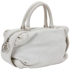 Chanel ice white bowler bag , resistant leather and silver tone hardware. Handle drop 6". Comes with hologram, id card and generic dust cover. Bowler Bag, Silver Bags, Chanel Chanel, Bag Design, Vintage Chanel, Dust Cover, West Hollywood, Lady Dior, Coco Chanel