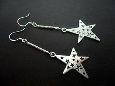 This a pair of cute tibetan silver star themed earrings with 925 solid silver hooks. Measure approx. 7cm from top of hook to bottom of earring. Freshly made by me and unworn. Thanks for looking!! Handmade Silver Star Earrings, Bohemian Star-shaped Nickel-free Earrings, Bohemian Silver Star-shaped Earrings, Bohemian Silver Star Earrings, Silver Adjustable Star Earrings, Adjustable Star-shaped Sterling Silver Earrings, Adjustable Sterling Silver Star Earrings, Silver Star-shaped Earrings With Ear Wire, Beaded Bookmarks