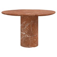 a round marble dining table with an orange finish on the top and white veining