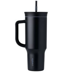 the black travel mug has a handle and is holding a straw in it's mouth