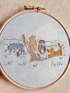 an embroidery project with animals on it