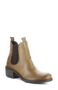 A curved toe and walkable stacked heel lend contemporary updates to a classic Chelsea boot featuring a cushy foam footbed for superior support with every step. 1 1/4" heel (size 39W) 4 3/4" shaft Pull-on style with elastic-gore insets Removable insole Foam- and latex-cushioned footbed Leather and textile upper/textile lining/rubber sole Made in Portugal Women's Shoes Classic Boots With Cushioned Footbed, Medium Width, Cushioned Footbed Boots Medium Width For Workwear, Cushioned Footbed Boots For Workwear, Cushioned Medium Width Boots For Workwear, Modern Chelsea Boots With Stacked Heel And Round Toe, Ankle-high Boots With Cushioned Footbed, Medium Width, Medium Width Cushioned Ankle-high Boots, Ankle-high Boots With Cushioned Footbed, Medium Width Closed Toe Boots With Heel Pull Tab