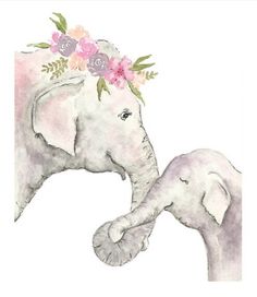 an elephant with flowers on it's head is touching another elephant's trunk