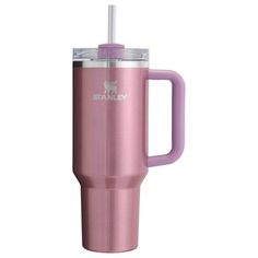 a pink tumbler cup with a straw in the top and handle is shown against a white background