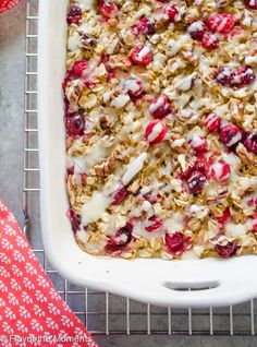 an oatmeal dish with cranberries and yogurt