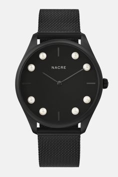 A minimal, modernist watch with a black, sandblasted dial. Eight Cabochon pearls have been hand-set on the face of the watch, marking the eight lunar phases. Paired with a matte black mesh strap. Lunar Phases, Minimalist Watch, Saddle Leather, Stainless Steel Mesh, The Watch, Steel Mesh, Navy Leather, Black Stainless Steel, Black Mesh