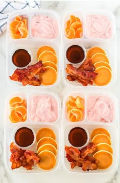 six plastic trays filled with different types of food on top of a marble counter