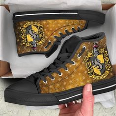 harry potter high top shoes with hogwarts crest on the front and bottom side