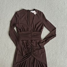 Brand New ! This Dress Is Between 1500-2000 Not Sure Of Exact Price . It’s Michael Kors Collection . Formal Brown Ruched Midi Dress, Elegant Brown Ruched Midi Dress, Brown V-neck Mini Dress For Formal Occasions, Formal Brown V-neck Mini Dress, Michael Kors Dresses Black, Michael Kors Dress Print Salmon, Michael Kors Dress Orange Print, Michael Kors Floral Georgette Dress Long Sleeve, Michael Kors 4-inch Heel Synthetic Heels