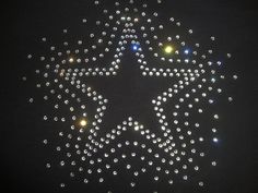 a star made out of bubbles on a black background