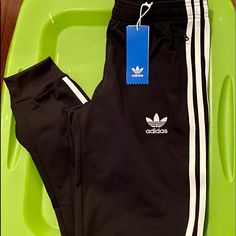 Adidas Yoith Black Track Pants-Ym Nwt Stretch Black Sweatpants With Three Stripes, Black Stretch Sweatpants With Three Stripes, Adidas Stretch Sweatpants For Streetwear, Adidas Black Pants For Spring, Adidas Black Pants With Pockets, Adidas Black Three Stripes Joggers, Adidas Black Joggers With Three Stripes, Adidas Black Sweatpants With Three Stripes, Adidas Casual Black Bottoms