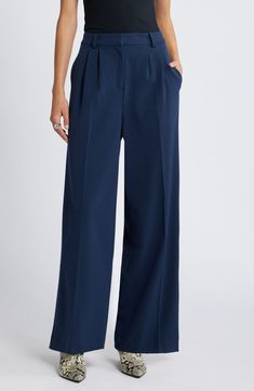 Move from desk days to drinks dates in gracefully draped pants cut from a feel-good fabric. 30" inseam; 24" leg opening; 13" front rise; 16 1/2" back rise (size 8) Zip fly with hook-and-bar closure 62% REPREVE® recycled polyester, 33% rayon, 5% spandex REPREVE recycled polyester is made from 100% post-consumer recycled plastic bottles Machine wash, tumble dry Imported Navy Wide Leg Pants, Draped Pants, Drape Pants, Navy Blazer, Recycle Plastic Bottles, Recycled Plastic, Plastic Bottles, Leg Pants, Wide Leg Pants