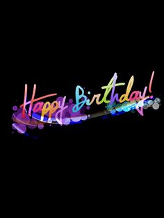 happy birthday text with colorful lights on black background