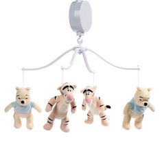 three small stuffed animals hanging from a white ceiling hook with a mirror on top of it