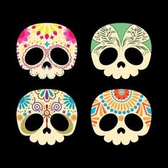 four sugar skulls with different colors and designs on black background stock photo - budget conscious