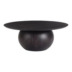 a wooden table with a black top on a white background in the shape of a ball