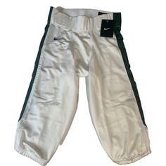 Nike -White, Green Panel -Football Pants -Size Small -13” Waist -11” Rise -14 1/2” Inseam -23” Length. Fitted Bottoms For Sports Season, Fitted Bottoms For Sports Events, Team-colored Bottoms For Game Day, Collegiate White Bottoms For Sports Events, Green Sports Bottoms For Sports Season, White Nike Bottoms For Sports Events, Nike Sporty White Pants, Sporty White Pants For Sports Season, Sporty Green Bottoms For Sports Events