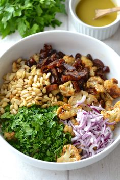 a white bowl filled with different types of food