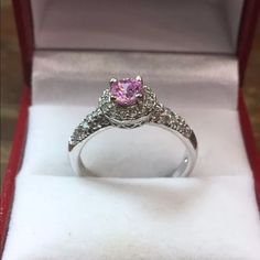 New Cubic Zirconia Handset Engagement Ring 14k White Gold Layer On Solid .925 Sterling Silver Size - 7.75 Top Width : 0.35" Inches (8.9 Mm) Top Height : 0.35" Inches (8.9 Mm) This Ring Can Be Resize Please Message Us If You Need Resizing Before You Buy . Free Gift Box Plus Don't Forget To Follow Us On Facebook, Instagram, Twitter, And Youtube . Thanks Item # Jn03261753-S-053 Silver Birthstone Ring With Center Stone As Gift, Cubic Zirconia Crystal Ring With Halo Setting As Gift, Dazzling Pink Sterling Silver Ring, Classic Pink Jewelry For Promise, Fine Jewelry Cubic Zirconia Birthstone Ring With Halo Setting, Cubic Zirconia Birthstone Ring With Halo Setting, Fine Jewelry Halo Ring With Center Stone As Gift, Classic Pink Cluster Ring For Anniversary, Princess Cut Halo Ring With Center Stone As Gift