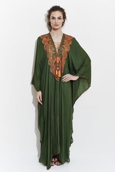 El Fenn is an authentic Moroccan kaftan. It is great to wear as a swim cover up, from morning until nighttime making a very elegant statement. This vibrant kaftan is ultra soft, made from the finest Egyptian cotton. 100% Cotton Natural Dyes One Size Dry Clean Handmade in Morocco MAISON DU CAFTAN El Fenn, Raffia Crochet, Goddess Gown, Moroccan Clothing, Moroccan Kaftan, Kaftan Maxi Dress, Long Kaftan, Silk Ikat, One Clothing