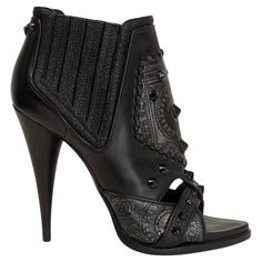 100% authentic Givenchy studded open-toe ankle-booties in black calfskin with elastic inserts on the side. Brand new. Measurements Imprinted Size 38 Shoe Size 38 Inside Sole 25cm (9.8in) Width 7.5cm (2.9in) Heel 12cm (4.7in) All our listings include only the listed item unless otherwise specified in the description above. Luxury Black Booties With Leather Sole, Luxury Leather Open Toe Boots, Luxury Open Toe Leather Boots, Designer Leather Open Toe Boots, Studded Leather Open Toe Heels, Leather Open Toe Heels With Studs, Studded Open Toe Leather Heels, Designer Open Toe Boots With Reinforced Heel, Peep Toe Ankle Boots