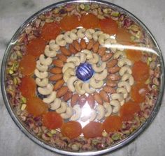 a bowl filled with nuts and dried fruits