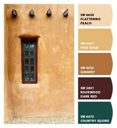 the color scheme for this stucco house is brown, green, and beige with red accents