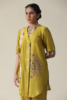 Green tunic featuring side patchwork pattern, embellished by beads, mirror, tassels and embroidered mandala motifs. Comes with striped pant. - Aza Fashions Hand Painted Kurtis, Tunic With Pants, Striped Pant, Pink Tree, Cord Set, Kurti Embroidery Design, Pant For Women, Dress Design Patterns, Kurta Designs Women